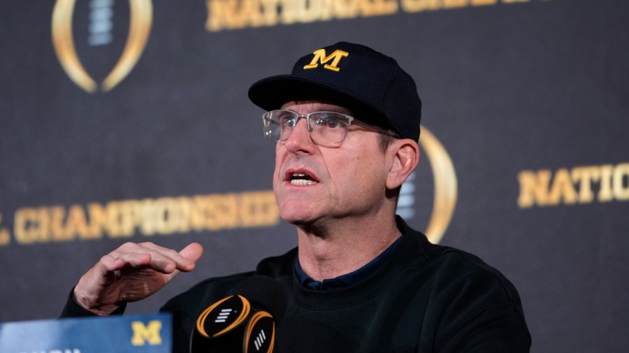 Michigan head coach Jim Harbaugh speaks during an NCAA college football news conference Tuesday, Jan. 9, 2024, in Houston.