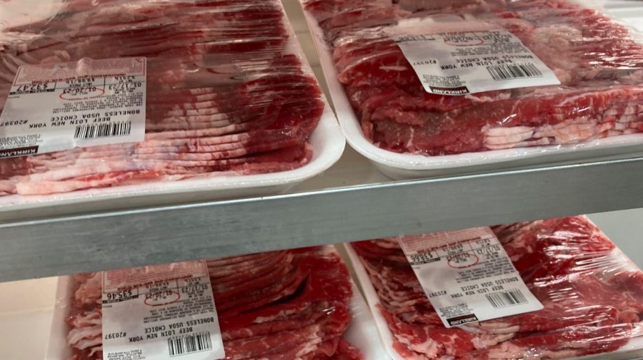 Packages of beef are prepared for display at a food store, Tuesday, Jan. 17, 2023, in North Miami, Fla.