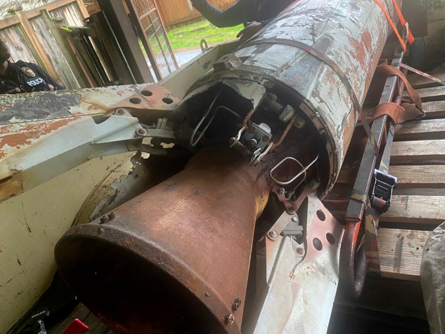 This image provided by Bellevue, Wash. Police Department shows a an inert rocket in the garage of a home in Bellevue, Wash, on Thursday, Feb. 1, 2024. Bellevue police responded Thursday to a report of a military-grade rocket in the garage of a home of a deceased resident in the city across Lake Washington from Seattle.(Bellevue, Wash. Police Department via AP)