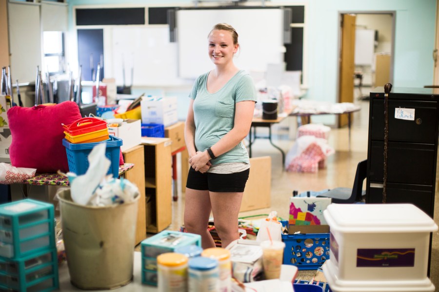 FILE - Kindergarten school teacher, Shannon Raftery poses for a photograph in her classroom as she prepares it for the upcoming school year in Philadelphia, Aug. 31, 2016. Raftery raised funds through crowdfunding to supplement the money she took out of each paycheck to pay for classroom supplies. GoFundMe crowdfunding campaigns have generated $30 billion since 2010, the fundraising platform announced Tuesday, Feb. 6, 2024. (AP Photo/Matt Rourke, File)