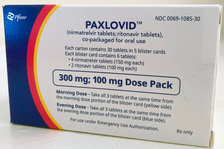 FILE - The anti-viral drug Paxlovid is displayed in New York, Aug. 1, 2022. For some people with COVID-19, antiviral pills that can be taken at home can lessen the chances of winding up in the hospital. But the pills have to be taken right away, so you must get tested, obtain a prescription and get the medication within five days of symptoms appearing. The medication is intended for those with mild or moderate COVID-19 who are more likely to become seriously ill. (AP Photo/Stephanie Nano, file)