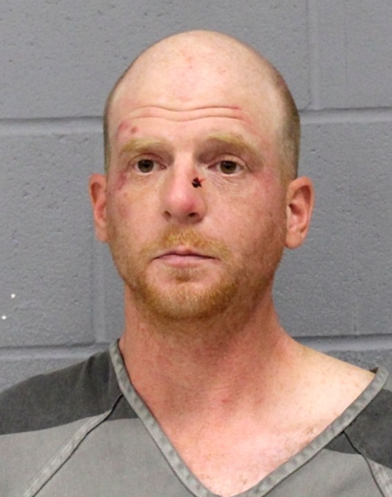 This booking photo released by the Austin, Texas, Police Department shows Bert James Baker, 36, who was arrested following a Sunday evening, Feb. 4, 2024, attack on Zacharia Doar, who was hospitalized. Baker was charged with aggravated assault with a deadly weapon. Police said Wednesday, Feb. 7, 2024, that their Hate Crimes Review Committee had determined that the stabbing met the definition of a hate crime. (Austin Police Department via AP)