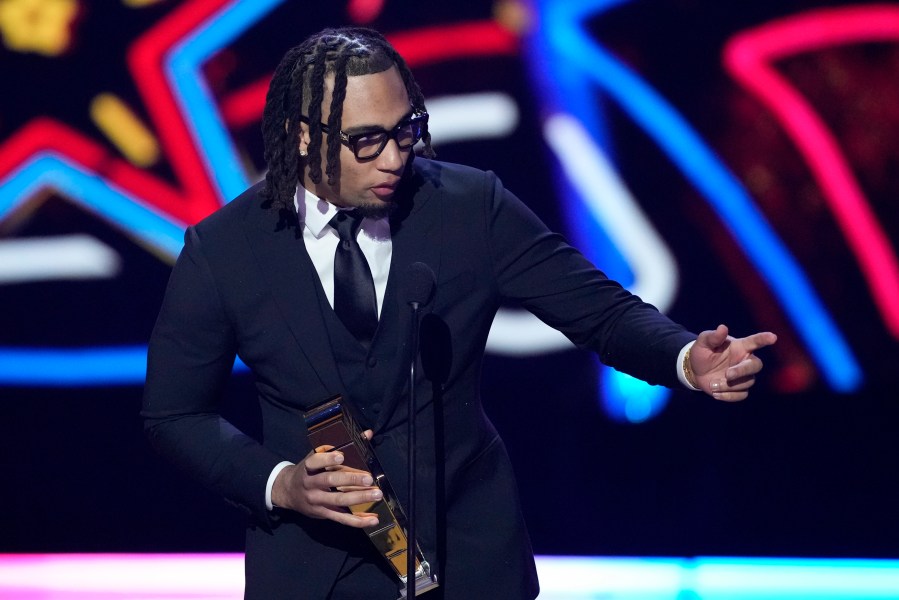 Houston Texans' C.J. Stroud, AP offensive rookie of the year speaks during the NFL Honors award show ahead of the Super Bowl 58 football game Thursday, Feb. 8, 2024, in Las Vegas. The San Francisco 49ers face the Kansas City Chiefs in Super Bowl 58 on Sunday. (AP Photo/David J. Phillip)