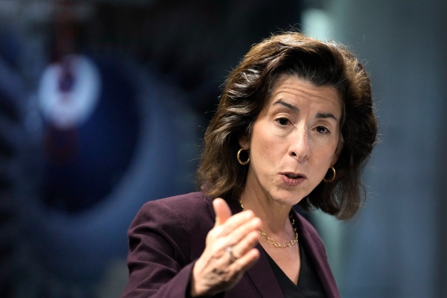 FILE - U.S. Commerce Secretary Gina Raimondo speaks Dec. 11, 2023, during a visit to BAE Systems, in Nashua, N.H. The Biden administration on Friday, Feb. 9, 2024, will announce the investment of $5 billion in a public-private consortium aimed at supporting research and development in advanced computer chips. (AP Photo/Steven Senne, File)