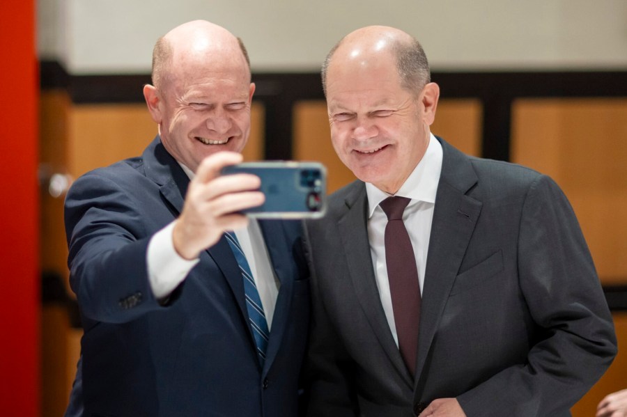 CORRECTS SOURCE TO BUNDESREGIERUNG - In this photo provided by Bundesregierung, from left, Sen. Chris Coons, D-Del., and German Chancellor Olaf Scholz pose for a selfie on X, formerly Twitter, on Oct. 8, 2024. Both were seeing double when they met in Washington, D.C., this week and went on social media to share their mirror image with the world. (Bundesregierung via AP)