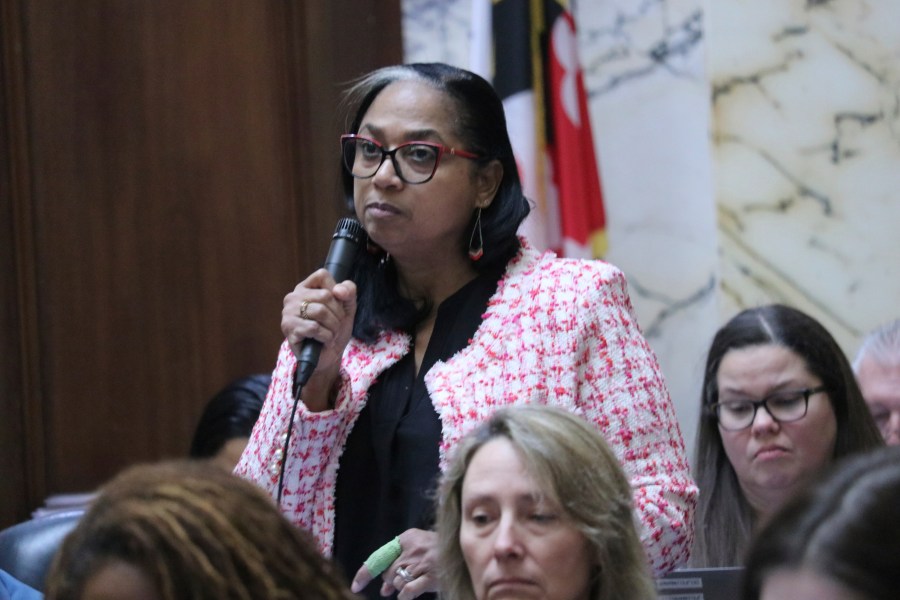 Maryland Del. Joseline Pena-Melnyk, a Democrat who chairs the Maryland House Health and Government Operations Committee, speaks in favor of a bill to enable people to buy health insurance through the state's health care exchange regardless of their immigration status, with approval of a federal waiver during debate on Friday, Feb. 23, 2024, in Annapolis, Md. (AP Photo/Brian Witte)