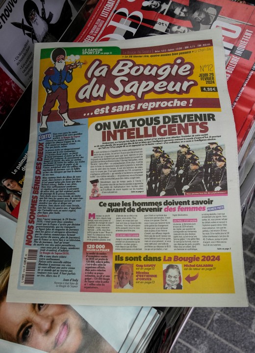 The satirical French newspaper 'La Bougie du Sapeur' is photographed at a newspaper shop in Paris, Thursday, Feb. 29, 2024. Satirical French newspaper La Bougie du Sapeur only comes out on Feb. 29, once every four years. Some friends started the leap year newspaper as a joke in 1980, so the one published Thursday was just its 12th edition. (AP Photo/Michel Euler)