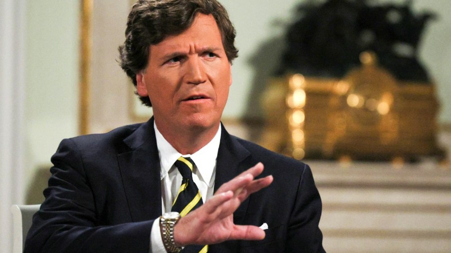 File - In this photo released by Sputnik news agency on Friday, Feb. 9, 2024, former Fox News host Tucker Carlson gestures during an interview with Russian President Vladimir Putin, at the Kremlin in Moscow, Russia, Tuesday, Feb. 6, 2024.