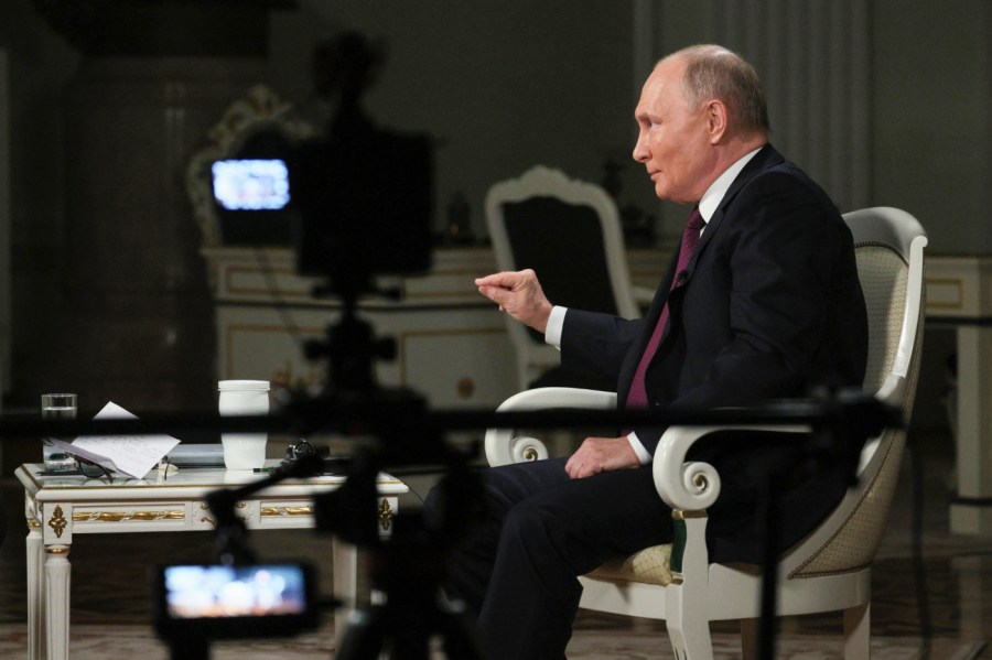 In this photo released by Sputnik news agency on Friday, Feb. 9, 2024, Russian President Vladimir Putin gestures while speaking during an interview with former Fox News host Tucker Carlson at the Kremlin in Moscow, Russia, Tuesday, Feb. 6, 2024.