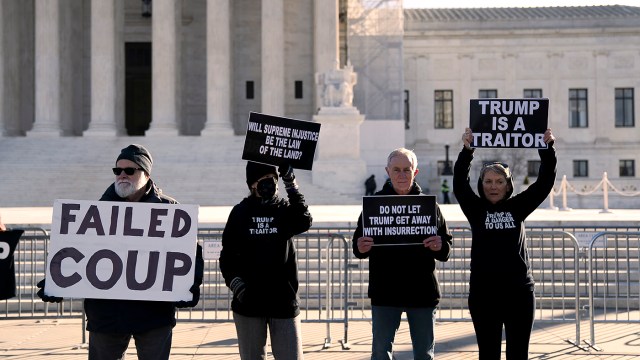 People against former President Trump gather outside the Supreme Court in Washington, D.C., ahead of oral arguments in Trump v. Anderson