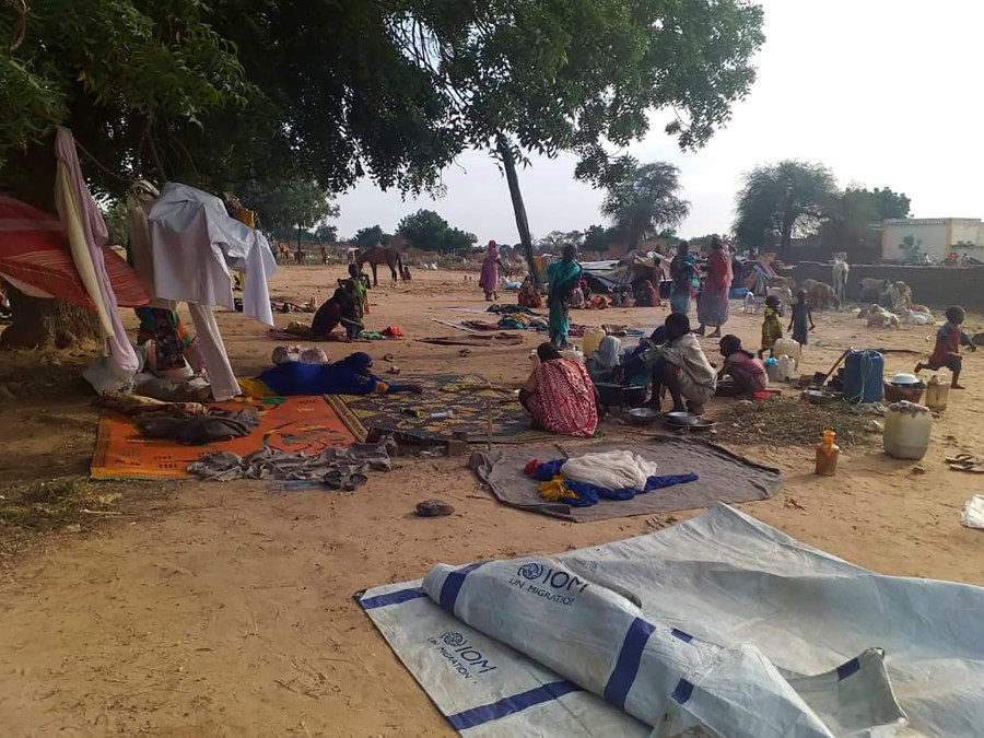 FILE - Residents displaced from a surge of violent attacks squat on blankets and in hastily made tents in the village of Masteri in west Darfur, Sudan, on July 30, 2020. Paramilitary forces and their allied militias fighting to take power in Sudan carried out widespread ethnic killings and rapes while taking control of much of western Darfur that may amount to war crimes and crimes against humanity, according to a new report to the U.N. Security Council, obtained Thursday, Feb. 29, 2024, by The Associated Press. (Mustafa Younes via AP, File)