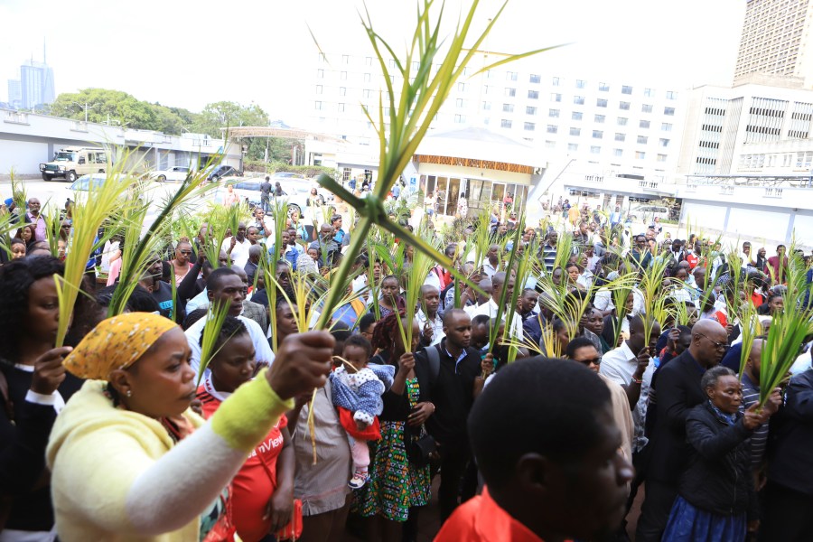 FILE - Christian faithful march carrying green Palm branches to commemorate Palm Sunday, which marks the entry of Jesus Christ into Jerusalem, in the streets of Nairobi, Kenya, Sunday, April 2, 2023. Palm Sunday will be celebrated by Christians worldwide Sunday, March 24, 2024. It commemorates the Christian belief in the triumphant entry of Jesus into Jerusalem, when palm branches were strewn before him. It marks the start of Holy Week. (AP Photo, File)