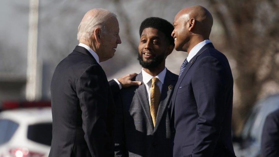 President Joe Biden greets Baltimore Mayor Brandon Scott and Maryland Governor Wes Moore.