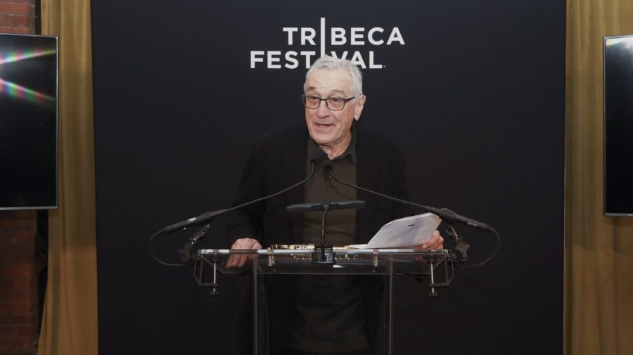 Robert De Niro speaks at an event.