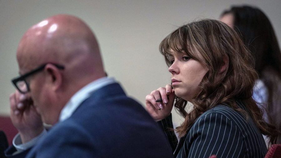 Hannah Gutierrez-Reed sits with her attorney Jason Bowles.