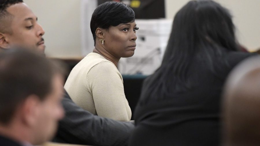 Crystal Mason sits at the defense table.