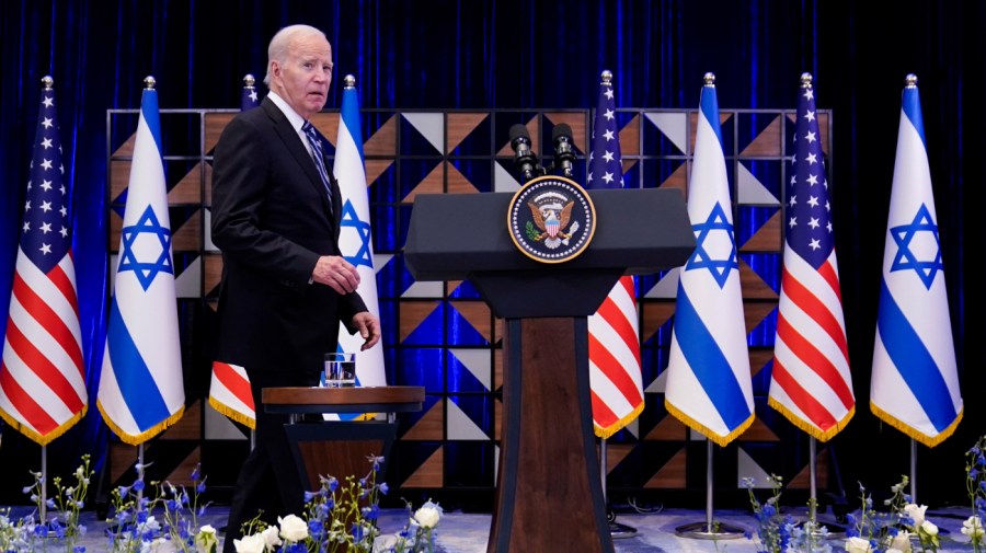 President Joe Biden walks to the podium to deliver remarks on the war between Israel and Hamas after meeting Israeli Prime Minister Benjamin Netanyahu, Wednesday, Oct. 18, 2023, in Tel Aviv.