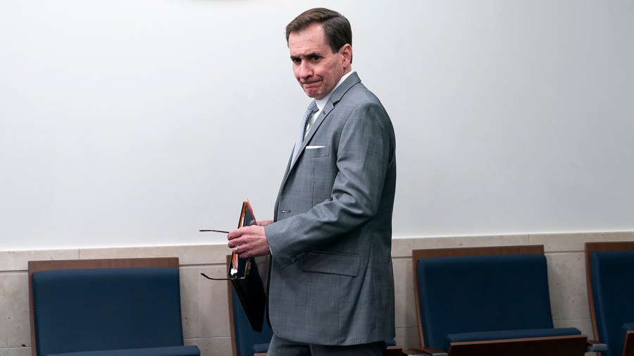 White House national security communications adviser John Kirby arrives for a daily briefing at the White House.