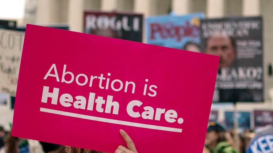 Supporters for and against abortion are seen outside the Supreme Court