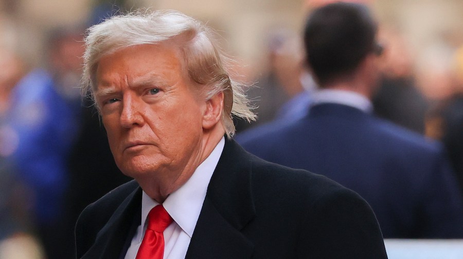 Former President Trump arrives for a press conference in New York.