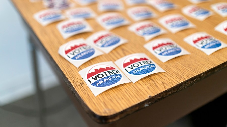 ‘I Voted’ stickers are seen at the H-B Woodlawn Secondary Program polling station in Arlington, Va.