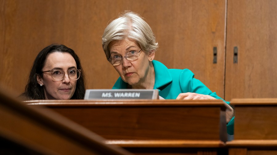 Senator Elizabeth Warren participates in a committee hearing.