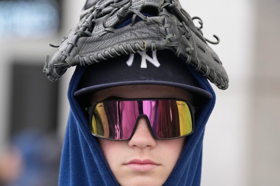 Trevor Petrowsky waits in line to enter Yankee Stadium in New York before the home opener baseball game between the New York Yankees and Toronto Blue Jays, Friday, April 5, 2024. (AP Photo/Seth Wenig)