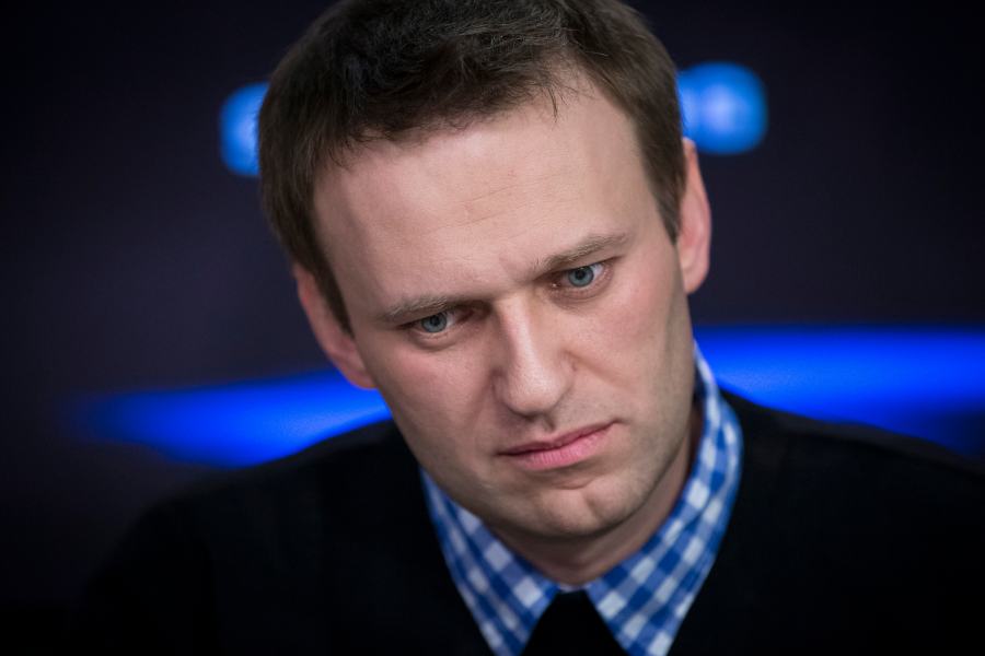 FILE - Russian opposition leader Alexey Navalny listens to a question during an interview at the Echo Moskvy (Echo of Moscow) radio station in Moscow, Russia, Monday, April 8, 2013. A memoir Alexei Navalny began working on in 2020 will be published this fall. “Patriot,” which publisher Alfred A. Knopf is calling the late Russian opposition leader's “final letter to the world,” will come out Oct. 22, 2024. (AP Photo/Alexander Zemlianichenko, File)