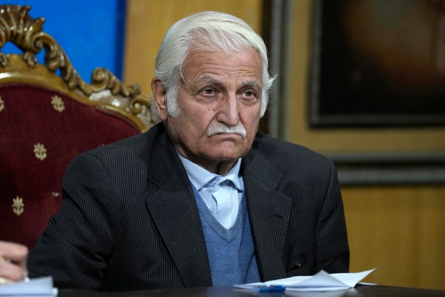 FILE - Farhatullah Babar, a veteran human rights activist and member of the Human Rights Commission of Pakistan, listens to a reporter during a news conference, in Islamabad, Pakistan, Monday, Jan. 1, 2024. Babar, an important ally of Pakistani Prime Minister Shehbaz Sharif, demanded the government lift a two-month-old ban on the social media platform X, saying it violates citizens' right to speech and expression. (AP Photo/Anjum Naveed, File)