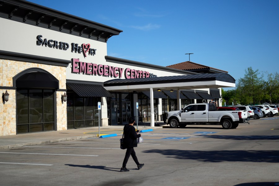 Sacred Heart Emergency Center is pictured Friday, March 29, 2024, in Houston. Complaints about pregnant women being turned away from emergency rooms spiked in the months after states began enacting strict abortion laws following the 2022 U.S. Supreme Court decision overturning Roe v. Wade. At Sacred Heart Emergency Center in Houston, front desk staff refused to check-in one woman after her husband asked for help delivering her baby. She miscarried in a restroom toilet in the emergency room lobby while her husband called 911 for help. (AP Photo/David J. Phillip)