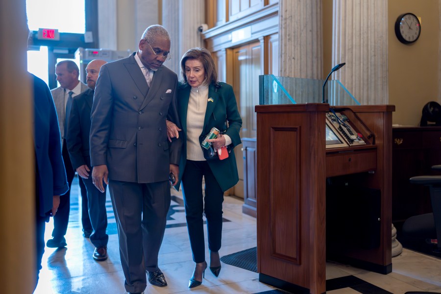 Rep. Gregory Meeks, D-N.Y., the ranking member of the House Foreign Affairs Committee, left, walks with Rep. Nancy Pelosi, D-Calif., the speaker emerita, as lawmakers arrive to vote on approval of $95 billion in foreign aid for Ukraine, Israel and other U.S. allies. (AP Photo/J. Scott Applewhite)