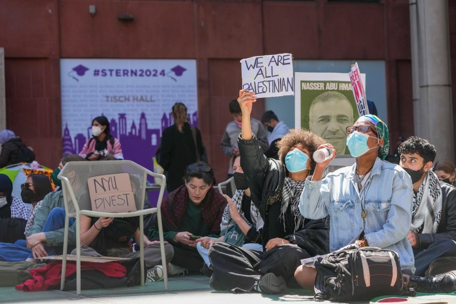 New York University students and pro-Palestinian supporters rally outside the NYU Stern School of Business building, Monday, April 22, 2024, in New York. (AP Photo/Mary Altaffer)