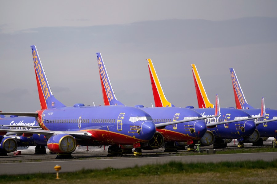 FILE - A line of Southwest Air Boeing 737 jets are parked near the company's production plant while being stored at Paine Field Friday, April 23, 2021, in Everett, Wash. Southwest Air reports earnings on Thursday, April 25, 2024. (AP Photo/Elaine Thompson, File)