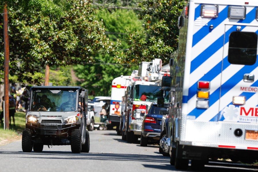 A Charlotte neighborhood where an officer-involved shooting took place in Charlotte, N.C., Monday, April 29, 2024. The Charlotte-Mecklenburg Police Department says officers from the U.S. Marshals Task Force were carrying out an investigation Monday afternoon in a suburban neighborhood when they came under gunfire. (AP Photo/Nell Redmond)