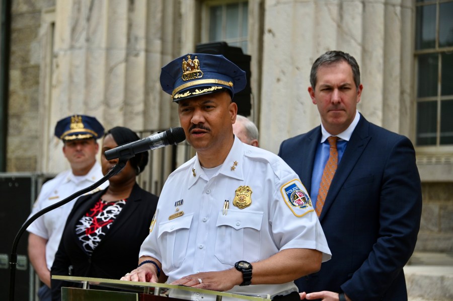 FILE - Baltimore County Police Chief Robert McCullough and other local officials speak at a news conference in Towson, Md., April 25, 2024. The most recent criminal case to involve artificial intelligence has emerged from a high school in Baltimore County, Maryland. That's where police say a principal was framed by a fake recording of his voice. (Kim Hairston/The Baltimore Sun via AP, file)