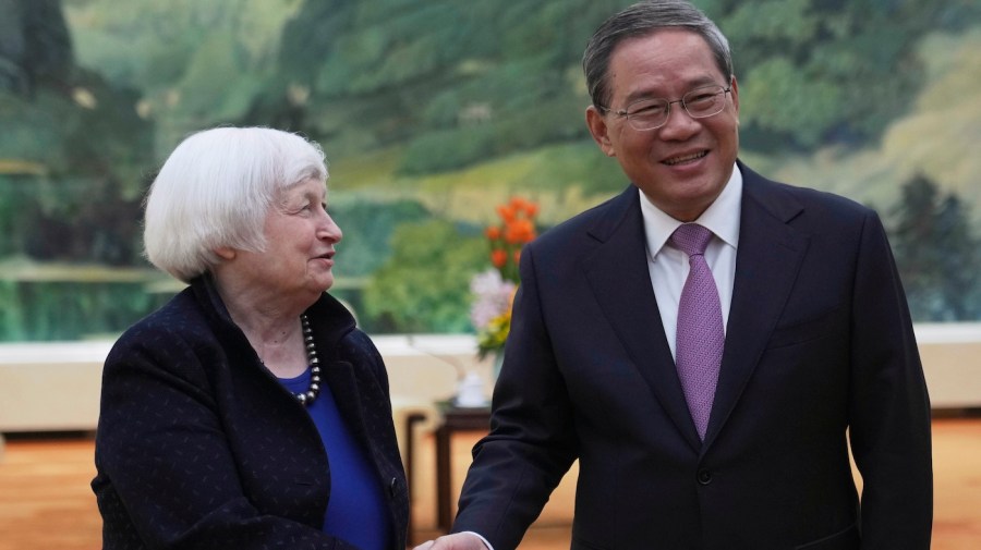 Janet Yellen shakes hands with Chinese Premier Li Qiang.