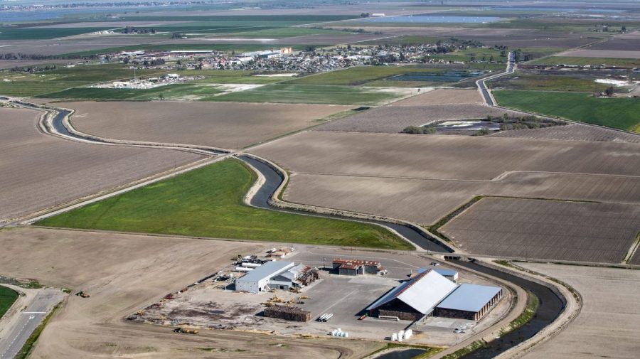 Farmland is seen from an arial shot.