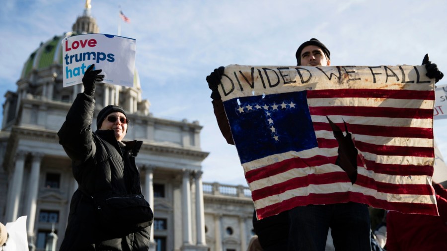 Protesters demonstrate ahead of Pennsylvania's 58th Electoral College at the state Capitol in Harrisburg, Pa., Monday, Dec. 19, 2016.