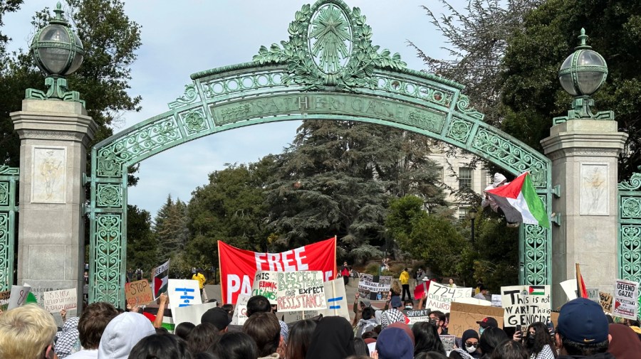 A student protest about the war in Israel/Gaza takes place at the University of California, Berkeley's Sather Gate on Monday, Oct. 16, 2023. (AP Photo/Michael Liedtke)