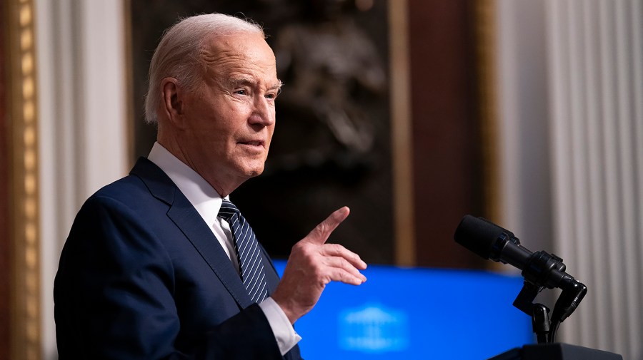 President Biden points his finger while speaking at the White House.