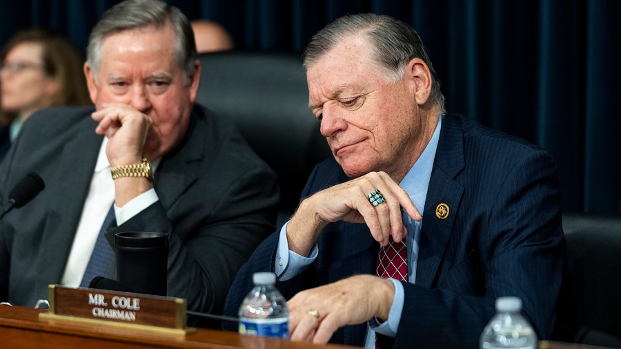 Rep. Ken Calvert (R-Calif.) speaks with Rep. Tom Cole (D-Okla.)