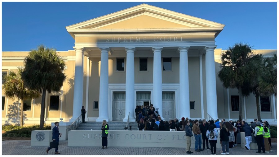 People gather outside the Florida Supreme Court.