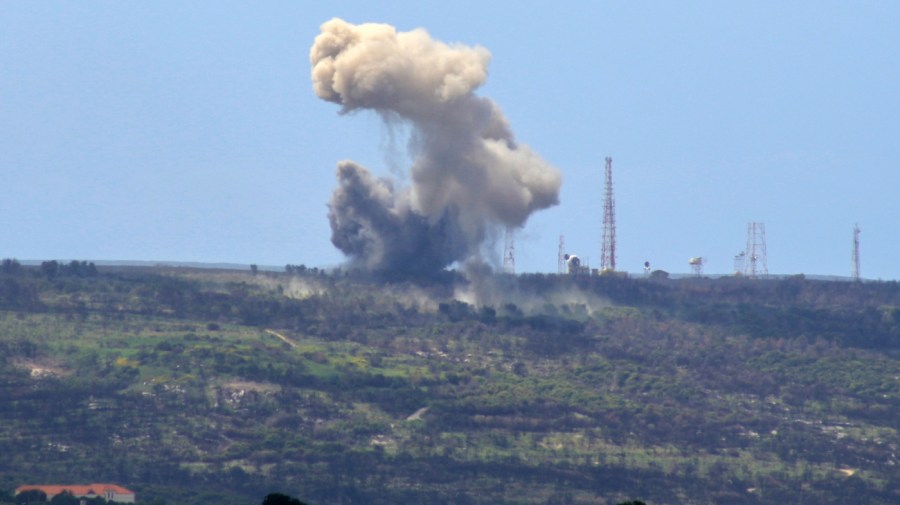 A picture taken from the southern Lebanese village of Alma al-Shaab shows smoke rising from an Israeli outpost after a rocket attack by Lebanon's Hezbollah movement fighters on April 6, 2024.