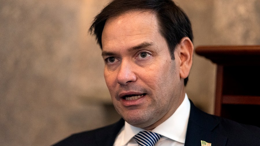 Senator Marco Rubio speaks to reporters in a close-up.