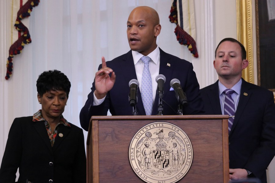 Maryland Gov. Wes Moore speaks at a bill-signing ceremony on Thursday, May 9, 2024, in Annapolis, Md., where he signed two measures into law that are aimed at safeguarding personal data online from Big Tech, including a bill making Maryland the second state to create strong limits on information collected on children. Maryland House Speaker Adrienne Jones is standing left, and Maryland Senate President Bill Ferguson is standing right. (AP Photo/Brian Witte)