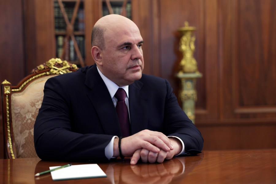 Candidate for the post of Russian Prime Minister Mikhail Mishustin listens to Russian President Vladimir Putin during their meeting at the Kremlin in Moscow, Russia, Friday, May 10, 2024. (Gavriil Grigorov, Sputnik, Kremlin Pool Photo via AP)