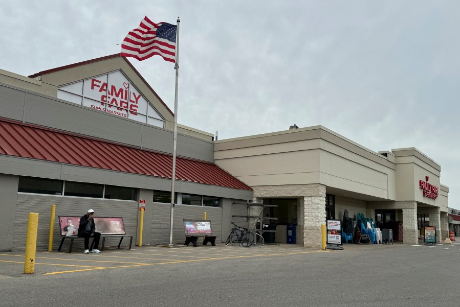 A Family Fare store is shown in Midland, Mich., Thursday, May 9, 2024. Contractors curious about an extension cord on the roof of a Michigan grocery store made a startling discovery: A 34-year-old woman was living inside the business sign, with enough space for a computer, printer and coffee maker, police said. (Dave Clark/Midland Daily News via AP)