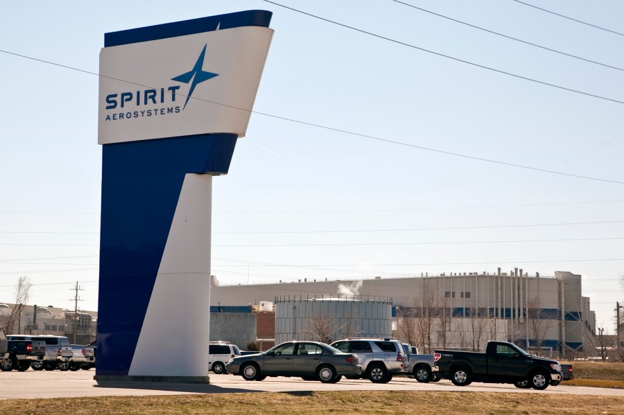 FILE - The Spirit AeroSystems sign is seen, July 25, 2013, in Wichita, Kan. The key Boeing supplier that makes the fuselages for its popular 737 Max airplanes confirmed Thursday, May 16, 2024, that it is laying off about 450 workers because production has slowed down ever since a panel flew off of one of those airplanes operated by Alaska Airlines in midair in January. (Mike Hutmacher/The Wichita Eagle via AP, File)