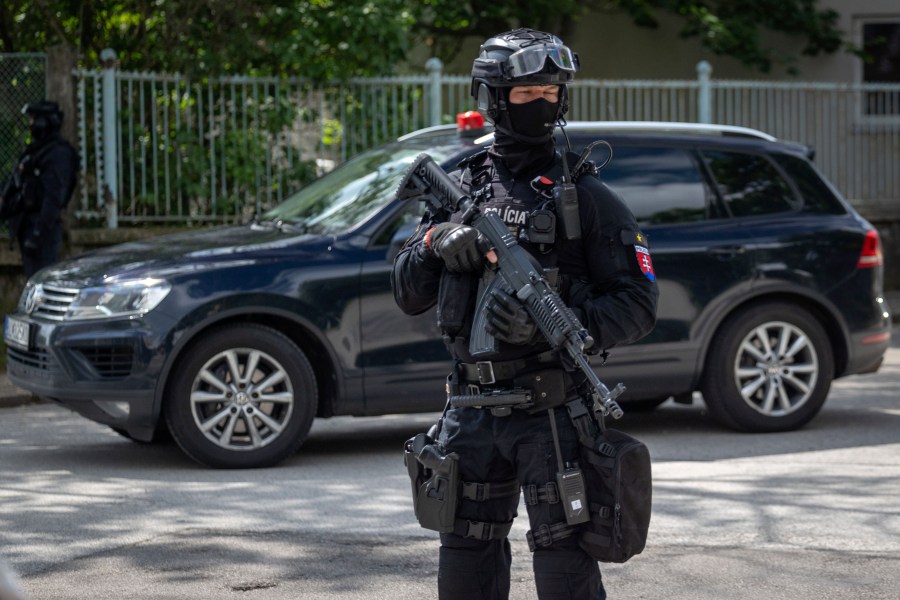 A car supposedly carrying the suspect, in shooting of Slovakia's Prime Minister Robert Fico, leaves the court in Pezinok, Saturday, May 18, 2024. Officials in Slovakia say Prime Minister Robert Fico has undergone another operation two days after his assassination attempt and remains in serious condition. (AP Photo/Tomas Benedikovic)