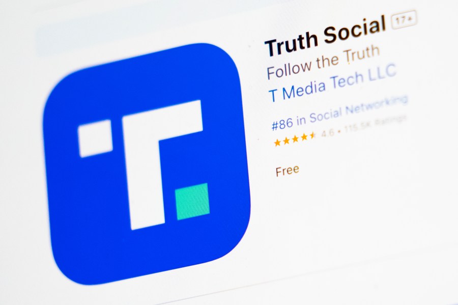 FILE - The download screen for Truth Social app is seen on a laptop computer, March 20, 2024, in New York. Trump Media and Technology Group, the owner of former President Donald Trump's social networking site Truth Social, lost more than $300 million last quarter, according to its first earnings report as a publicly traded company Monday, May 20. (AP Photo/John Minchillo, File)